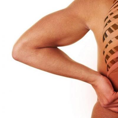 How does excess weight affect the spine and what diseases does it lead to?